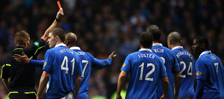 GLASGOW, SCOTLAND - MARCH 02: Referee Calum Murray sends off Madjid Bougherra of Rangers following his challenge on Kris Commons of Celtic during the Scottish Cup fifth round match between Celtic and Rangers at Celtic Park on March 2, 2011 in Glasgow, Scotland. (Photo by Jeff J Mitchell/Getty Images) *** Local Caption *** Madjid Bougherra;Calum Murray