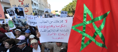 Several hundred people demonstrate on March 20, 2011 in Rabat, calling for further democratic reforms and social justice. More than 1,000 people, including many Islamists, rallied in Rabat in the morning. The so-called "February 20 movement" called for Sunday's protests to go ahead despite King Mohammed VI announcing sweeping democratic reforms last months, including an elected prime minister and broader personal freedoms. AFP PHOTO / ABDELHAK SENNA (Photo credit should read ABDELHAK SENNA/AFP/Getty Images)