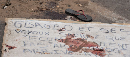 Pictured are allegedly the blood stains left on the street where at least six women were shot dead by security forces loyal to Ivory Coast's strongman, Laurent Gbagbo, on March 3, 2011 in Abobo, a working class neighborhood of Abidjan. Forces opened fire on hundreds of demonstrators calling for the ouster of Gbagbo. Violent clashes have erupted in the west African country since a disputed election on November 28 which Alassane Ouattara is internationally recognised to have won. About 300 people had been killed in the violence and thousands have fled, according to UN figures, and there are fears of a return to civil war. AFP PHOTO / ISSOUF SANOGO (Photo credit should read ISSOUF SANOGO/AFP/Getty Images)