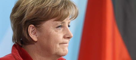BERLIN, GERMANY - MARCH 01: German Chancellor Angela Merkel reacts during a statement after German Defense Minister Zu Guttenberg resigns earlier the day at the Chancellery on March 1, 2011 in Berlin, Germany. German Defense Minister Karl-Theodor Zu Guttenberg announced he will step down following the scandal over his plagiarized doctoral thesis. (Photo by Andreas Rentz/Getty Images) *** Local Caption *** Angela Merkel