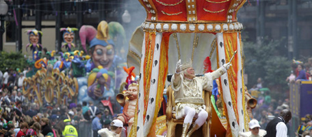 Rex, the King of Carnival rides in the Krewe of Rex as he arrives at Canal St. along St. Charles Ave. on Mardi Gras day in New Orleans, Tuesday, March 8, 2011. (AP Photo/Gerald Herbert)