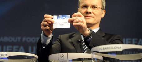 UEFA Competition Director, Giorgio Marchetti shows the name of Tottenham Hotspur FC during the draw for the last 16 of the UEFA Champions League on December 17, 2010 at the UEFA headquarters in Nyon. Seven previous winners and three debutants were among the sides in the hat with the first legs taking place on February 15-16 and 22-23, with the second legs on March 8-9 and 15-16. AFP PHOTO / SEBASTIEN FEVAL (Photo credit should read SEBASTIEN FEVAL/AFP/Getty Images)
