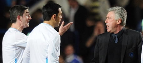 Chelsea's Italian manager Carlo Ancelotti (R) confronts Referee Alberto Undiano Mallenco (L) after the final whistle of their UEFA Champions League quarterfinal first-leg football match at Stamford Bridge, in London, on April 6, 2011. Manchester won 1-0. AFP PHOTO/ CARL DE SOUZA (Photo credit should read CARL DE SOUZA/AFP/Getty Images)