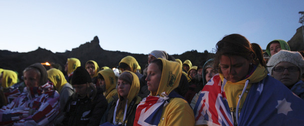Australians and New Zealanders listen during the Dawn Service at Anzac Commemorative Site in Gallipoli, Turkey, Monday, April 25, 2011. The World War I battlefield of the Gallipoli campaign, where throngs gather each April to remember the fallen, is a place of lore, an echo of ancient warfare on the same soil. On the 96th anniversary of the Gallipoli landings, thousands of people from Australia, New Zealand, England and Turkey will gather to remember the World War I campaign that cost hundreds of thousands of lives. The annual Anzac Day ceremony remembers the forces of the Australian and New Zealand Army Corps under British command who fought a bloody nine-month battle against Turkish forces on the Gallipoli peninsula in 1915. (AP Photo/Burhan Ozbilici)