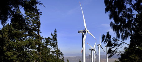 This photo taken on October 29, 2010 shows wind turbines in the Ngong hills, some 25 kms south-west of Nairobi, which are owned and run by Kenya's main power generating company KENGEN. The majority of Kenyans are unwilling to abandon their traditional energy sources in favour of cleaner or renewable ones unless their incomes rise significantly, a study has found. AFP PHOTO/Tony KARUMBA (Photo credit should read TONY KARUMBA/AFP/Getty Images)