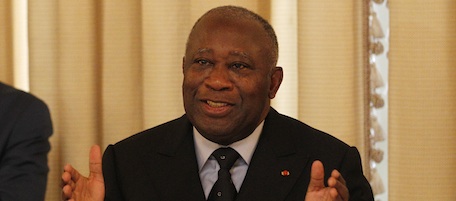 Incumbent president Laurent Gbagbo opens a meeting with a group of four Ivorians and three foreign nationals, unseen, whom he has invited to investigate alleged human rights abuses, at the presidency in Abidjan, Ivory Coast, Tuesday, Jan. 11, 2011. Security forces loyal to Ivory Coast's incumbent leader, who refuses to cede power, on Tuesday fired volleys of gunshots, leaving at least four people dead after they cordoned off a large section of a neighborhood known to be his rival's stronghold.(AP Photo/Rebecca Blackwell)