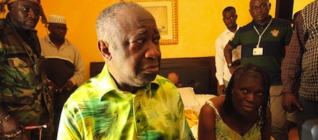 Ivory Coast strongman Laurent Gbagbo and his wife Simone sit on a bed at the Hotel du Golf in Abidjan after their arrest on April 11, 2011. Ivory Coast leader Alassane Ouattara's forces, backed by French and UN troops, captured his besieged rival Laurent Gbagbo in Abidjan today at the climax of a deadly five-month crisis. Gbagbo, who has held power since 2000 and stubbornly refused to admit defeat in November's presidential election, was detained and taken to his rival's temporary hotel headquarters, with his wife Simone and son Michel. AFP PHOTO / STR (Photo credit should read STR/AFP/Getty Images)