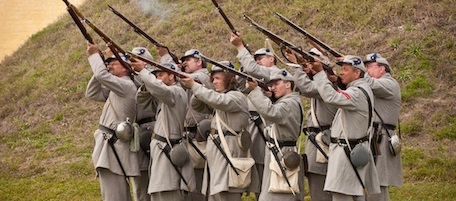 CHARLESTON, SC - APRIL 09: Confederate re-enactors fire their rifles during a display April 9, 2011 at Fort Moultrie in Charleston, South Carolina. The 150th anniversary of the first shot fired in the U.S. Civil War takes place April 12th. (Photo by Richard Ellis/Getty Images)