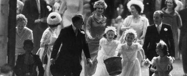 Princess Anne carrying a confetti basket leads the other bridesmaids at the wedding of her aunt Princess Margaret . On the left is Prince Charles with the Queen's uncle Sir David Bowes Lyon (brother of the Queen Mother). The Queen Mother is behind Princess Anne and on the right of the Queen Mother is the Duchess of Gloucester. (Photo by Victor Blackman/Getty Images)