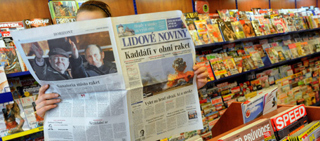 A picture taken on March 21, 2011 shows a customer reading ''Lidove Noviny'' newspaper in a shop in Prague. AFP PHOTO / MICHAL CIZEK (Photo credit should read MICHAL CIZEK/AFP/Getty Images)
