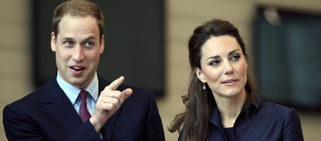 Britain's Prince William and his fiancee Kate Middleton watch a demonstration by students during a visit to Darwen Aldridge Community Academy in Darwen, north-west England, on April 11, 2011. The couple were at the academy to officially open the centre and also to launch the SkillForce Prince's Award. The SkillForce Prince's Award is to recognise the contribution that young people make to their communities. Prince William will marry Kate Middleton at Westminster Abbey in London, on April 29, 2011. AFP PHOTO/ADRIAN DENNIS/WPA POOL/AFP (Photo credit should read ADRIAN DENNIS/AFP/Getty Images)