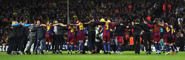 Barcelona's players celebrate after winning the Champions League semi-final second leg football match between Barcelona and Real Madrid at the Camp Nou stadium in Barcelona on May 3, 2011. Barcelona qualified for the Champions League final after drawing 1-1 in their semi-final second leg clash with bitter rivals Real Madrid to progress 3-1 on aggregate. AFP PHOTO/ JOSEP LAGO (Photo credit should read JOSEP LAGO/AFP/Getty Images)