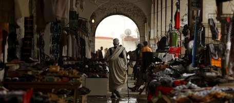 An elderly Libyanman, wearingin his country's national costume, walks through a market in the rebel stronghold city Benghazi on April 26, 2011. AFP PHOTO/MARWAN NAAMANI (Photo credit should read MARWAN NAAMANI/AFP/Getty Images)