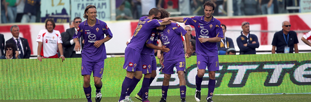 FLORENCE, ITALY - MAY 01: Fiorentina players celebrate a goal scored by Alessio Cerci during the Serie A match between ACF Fiorentina and Udinese Calcio at Stadio Artemio Franchi on May 1, 2011 in Florence, Italy. (Photo by Gabriele Maltinti/Getty Images)