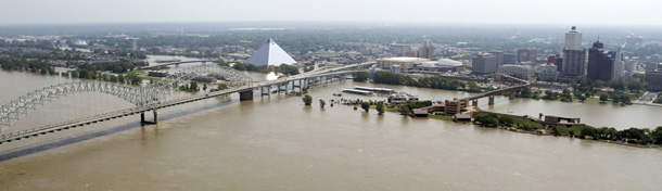 Flood waters from the Mississippi River encroach on Mud Island and parts of downtown Memphis, Tenn., Monday, May 9, 2011. The Mississippi crept toward the highest level ever in the river city, flooding pockets of low-lying neighborhoods and forcing hundreds from their homes, though the water was not threatening the music heartland's most recognizable landmarks, from Graceland to Beale Street. (AP Photo/Danny Johnston)