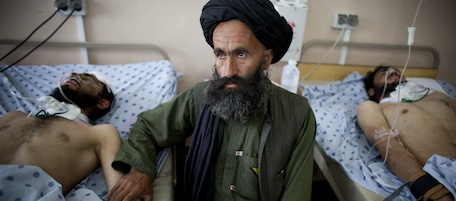 KANDAHAR, AFGHANISTAN - MAY 11: Men who were injured in Tailban attacks is treated in Mirvays Hospital May 11, 2011in Kandahar, Afghanistan. After the start of their annual spring offensive across the country, hundreds of Tailiban militants have begun to try and overrun several security posts meeting heavy defense from Afghan security forces. (Photo by Majid Saeedi/Getty Images)