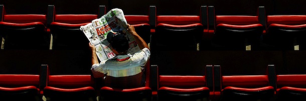 HANOVER, GERMANY - JUNE 12: A fan reads a newspaper prior to the FIFA World Cup Germany 2006 Group E match between Italy and Ghana played at the Stadium Hanover on June 12, 2006 in Hanover, Germany. (Photo by Shaun Botterill/Getty Images)