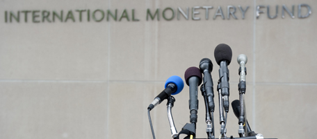 A microphone stand sits in front of International Monetary Fund (IMF) Headquarters in Washington, DC, May 16, 2011 in preparation for a statement to the press. The organization's director, Dominique Strauss-Kahn, faced arraignment in New York earlier Monday on allegations of sexual assault. AFP PHOTO / Saul LOEB (Photo credit should read SAUL LOEB/AFP/Getty Images)