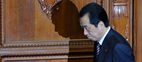 Japanese Prime Minister Naoto Kan attends a meeting of the ruling Democratic Party of Japan (DPJ) lower house members before a no-confidence motion against the prime minister in Tokyo on June 2, 2011. Japan's Prime Minister Naoto Kansurvived a no-confidence motion brought by the conservative opposition after he pledged to step down once the country has recovered from the March 11 quake. AFP PHOTO/Toru YAMANAKA (Photo credit should read TORU YAMANAKA/AFP/Getty Images)