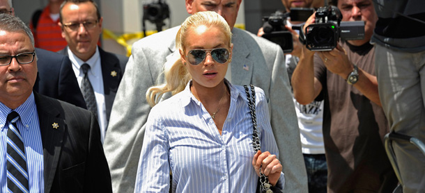LOS ANGELES, CA - JUNE 23: Actress Lindsay Lohan leaves the Airport Branch Courthouse after a probation hearing on June 23, 2011 in Los Angeles, California. Judge Stephanie Sautner ruled Lindsay Lohan did not violate the conditions of her probation after Lohan allegedly tested positive for alcohol. (Photo by Kevork Djansezian/Getty Images)