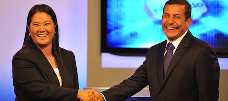 Presidential candidates (L-R) Congresswoman Keiko Fujimori leader of the Fuerza 2011 Party, daughter of former jailed Peruvian President Alberto Fujimori (1990-2000) and retired Army commander and presidential candidate for the Gana Peru Party, Ollanta Humala, pose for photographers at the culmination of a final televised debate in Lima on May 29, 2011, prior to the final electoral round next June 5, while both contenders show to be technically tied in the latest polls. AFP PHOTO/CRIS BOURONCLE (Photo credit should read CRIS BOURONCLE/AFP/Getty Images)