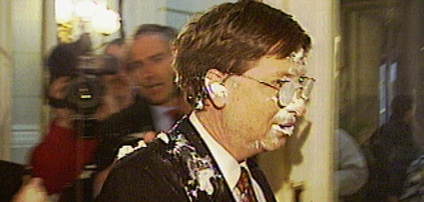 Bill Gates, the Chairman of Microsoft Corp., is seen after a pie was thrown into his face as he arrived at a meeting with business and government leaders in Brussels Wednesday, Feb. 4, 1998, in this image made from television. Police arrested two pranksters following the incident and said they were looking for a third. (AP Photo/VRT)