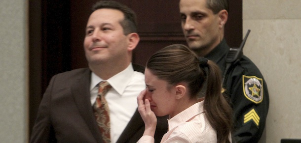 Defense attorney Jose Baez and Casey Anthony, react after the jury acquitted her of murdering her daughter, Caylee, during Anthony's murder trial at the Orange County Courthouse in Orlando, Fla., Tuesday, July 5, 2011. (AP Photo/Red Huber, Pool)