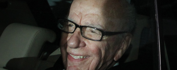 LONDON, ENGLAND - JULY 13: Rupert Murdoch, Chief Executive Officer of News Corp., smiles at photographers as he is driven from News International's headquarters on July 13, 2011 in London, England. News Corp. have announced that they are no longer bidding to by the remaining shares of BSkyB. (Photo by Peter Macdiarmid/Getty Images)