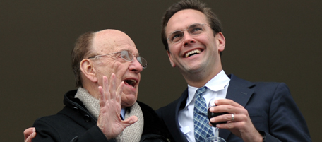 Media mogul Rupert Murdoch (C) stands beside his son James Murdoch (R) and daughter Elisabeth Murdoch (L) on a balcony overlooking the racing during the third day of horse racing at the Cheltenham Festival on March 18, 2010. Elisabeth Murdoch is to ride in a charity event later in the day. AFP PHOTO / Adrian Dennis (Photo credit should read ADRIAN DENNIS/AFP/Getty Images)