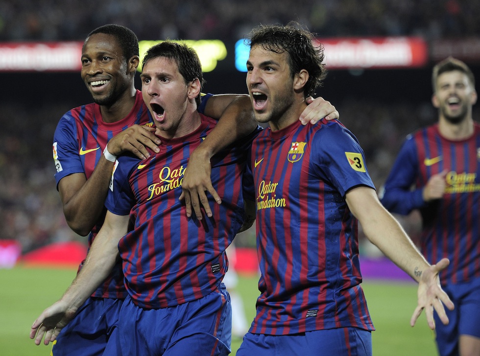 Lionel Messi, Cesc Fabregas e Seydou Keita. (JOSEP LAGO/AFP/Getty Images)