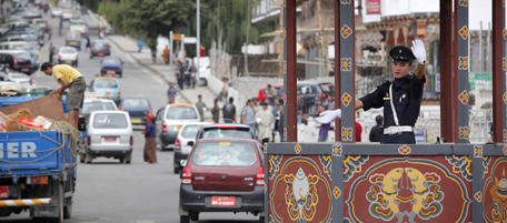 Photo taken on October 4, 2010 shows a trafffic warden directing traffic in the Bhutanese capital city of Thimphu. MORE ON IMAGE FORUM AFP PHOTO / ED JONES (Photo credit should read Ed Jones/AFP/Getty Images)