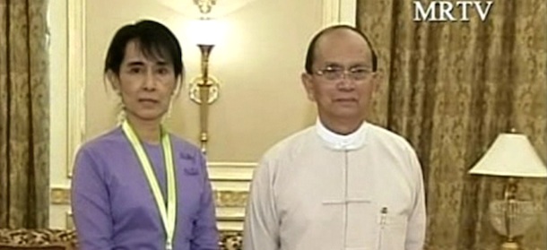 In this video image taken from MRTV democracy icon Aung San Suu Kyi, left, stands beside Myanmar President Thein Sein during a nearly one-hour meeting in the administrative capital Naypyitaw, Myanmar Friday Aug. 19, 2011. Myanmar's government invited democracy icon Aung San Suu Kyi to a meeting Friday with the president, an official said, in her highest contact with the new, nominally civilian government since her release from house arrest in November. The 66-year-old Nobel Peace Prize laureate has repeatedly called for political dialogue with the government since her release from seven years of house arrest. (AP Photo/MRTV) MYANMAR OUT