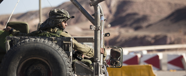 ISRAEL - AUGUST 19: (ISRAEL OUT) Israeli army troops patrol a position on the Israeli - Egyptian border, following yesterday's series of coordinated gun and roadside bomb attacks against military and civilian targets, August 19, 2011, north of the Red Sea town of Eilat, Israel. Israel blamed Gaza based militants for the series of roadside attacks, near the Israeli resort town of Eilat, that left at least eight people dead and later launched Gaza air strikes in retaliation. According to reports, Hamas official, Ahmed Yousef, welcomed the attacks but stated he did not believe that the political party carried them out. (Photo by Uriel Sinai/Getty Images)