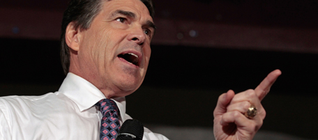 WATERLOO, IA - AUGUST 14: Republican presidential candidate and Texas Governor Rick Perry addresses the Blackhawk County Republican annual Lincoln Day Dinner at the Electric Park Ballroom August 14, 2011 in Waterloo, Iowa. Perry is in Iowa after announcing his candidacy for president a day earlier. (Photo by Chip Somodevilla/Getty Images)