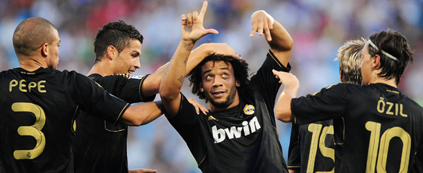 ZARAGOZA, SPAIN - AUGUST 28: Marcelo (C) of Real Madrid celebrates after scoring Real's 2nd goal during the La Liga match between Real Zaragoza and Real Madrid at estadio La Romareda on August 28, 2011 in Zaragoza, Spain. (Photo by Denis Doyle/Getty Images)
