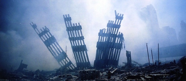 New York, UNITED STATES: TO GO WITH AFP STORY "Americans mark 9/11 anniversary with new questions on vulnerability" - (FILES) The rubble of the World Trade Center smoulders following a terrorist attack 11 September 2001 in New York. Americans mark the fourth anniversary of the September 11, 2001 terror attacks Sunday nagged by new burning questions about their readiness to confront a major disaster after the debacle of Hurricane Katrina. AFP PHOTO/Alex Fuchs (Photo credit should read ALEX FUCHS/AFP/Getty Images)