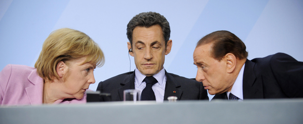 European leaders including (From L) German Chancellor Angela Merkel, French President Nicolas Sarkozy and Italian Prime Minister Silvio Berlusconi address a press conference following a G20 preparatory meeting in Berlin February 22, 2009. European G20 leaders agreed that all financial markets, products and participants should be subject to regulations and oversight, a German government source said at a meeting in the German capital ahead of the Group of 20 (G20) developed and major developing countries in London on April 2. AFP PHOTO DDP / AXEL SCHMIDT GERMANY OUT (Photo credit should read AXEL SCHMIDT/AFP/Getty Images)
