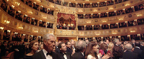VENICE &#8211; DECEMBER 14: Opera goers attend the reopening of the La Fenice opera house on December 14, 2003 in Venice, Italy. The opera house burned to the ground back in 1996. (Photo by Giuseppe Cacace/Getty Images)
