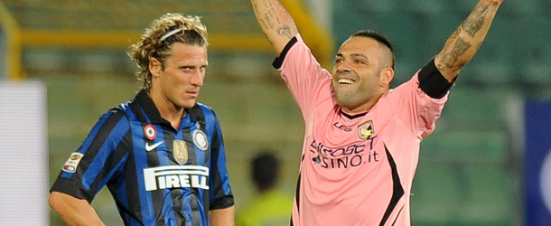 PALERMO, ITALY &#8211; SEPTEMBER 11: Diego Forlan (L) of Inter looks dejected as Fabrizio Miccoli (R) of Palermo celebrates after scoring Palermo&#8217;s fourth goal during the Serie A match between US Citta di Palermo and FC Internazionale Milano at Stadio Renzo Barbera on September 11, 2011 in Palermo, Italy. (Photo by Tullio M. Puglia/Getty Images)
