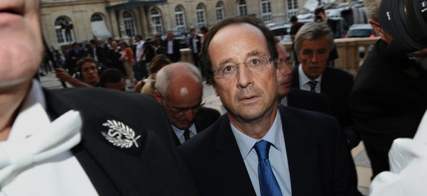 FranÃois Hollande (C), socialist candidate for the party&#8217;s 2011 primary vote for France&#8217;s 2012 presidential election, arrives at the French Senate on September 25, 2011 in Paris, as France&#8217;s left-wing opposition won an historic victory in senatorial elections today. The Socialist Party announced that, with its Communist and Green allies, it had won enough seats to take control of the upper house for the first time in modern French history, and its leaders were in buoyant mood. AFP PHOTO MIGUEL MEDINA (Photo credit should read MIGUEL MEDINA/AFP/Getty Images)
