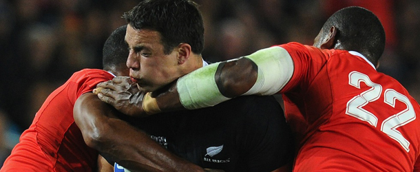 New Zealand All Blacks winger Richard Kahui (C) is blocked by Tonga's Alipate Fatafehi during the 2011 Rugby World Cup pool A match between New Zealand and Tonga at the Eden Park stadium in Auckland on September 9, 2011. AFP PHOTO / FRANCK FIFE (Photo credit should read FRANCK FIFE/AFP/Getty Images)