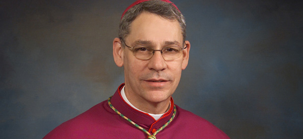 FILE &#8211; This May 3, 2004, file photo provided by the Archdiocese of Kansas City and St. Joseph, Mo., shows the Rev. Monsignor Robert Finn, who is facing a criminal charge for not telling police about child pornography that was found on a priest&#8217;s computer. Finn, now Bishop of the Kansas City-St. Joseph Catholic Diocese, pleaded not guilty Friday, Oct. 14, 2011, to a misdemeanor count of failing to report suspected child abuse. (AP Photo/Archdiocese of Kansas City and St. Joseph)
