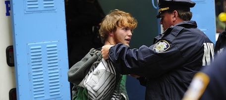 An &#8216;Occupy Wall Street&#8217; member is arrested during a protest march at the JP Morgan Chase Bank tower near Wall Street in New York, on October 12, 2011. AFP PHOTO/Emmanuel Dunand (Photo credit should read EMMANUEL DUNAND/AFP/Getty Images)
