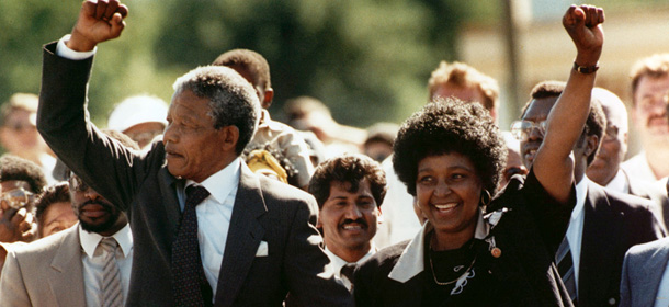 Nelson Mandela and wife Winnie, walking hand in hand, raise clenched fists upon his release from Victor prison, Cape Town, Sunday, February 11, 1990. The African National Congress leader had served over 27 years in detention. (AP Photo)

