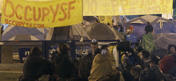 Occupy San Francisco protesters camp out in San Francisco, Wednesday, Oct. 26, 2011. San Francisco officials are warning anti-Wall Street protesters camped out in a city plaza that they face arrest if they continue to stay there around the clock. In a notice distributed on Tuesday, Police Chief Greg Suhr said the protesters in Justin Herman Plaza could be arrested on a variety of sanitation or illegal camping violations although police are not saying when that could occur. (AP Photo/Jeff Chiu)
