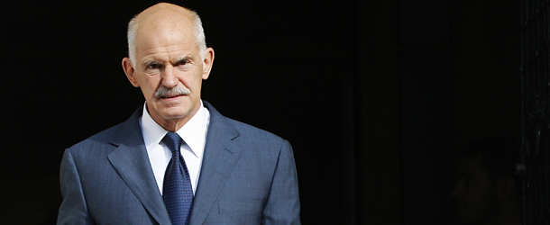 Greek Prime Minister George Papandreou exits the Greek presidency office to welcome the Emir of the State of Qatar Sheikh Hamad bin Khalifa Al Thani and the Prime Minister and Minister of Foreign Affairs Sheikh Hamad Bin Jassim Bin Jabr Al-Thani in Athens on October 1, 2011.Papandreou signed an agreement with the Emir of Qatar, Sheikh Hamad Bin Khalifa Al Thani for QatarÕs investment in the Halkidiki Mining Company ÒGreek Gold.Ó AFP PHOTO / ANGELOS TZORTZINIS (Photo credit should read ANGELOS TZORTZINIS/AFP/Getty Images)
