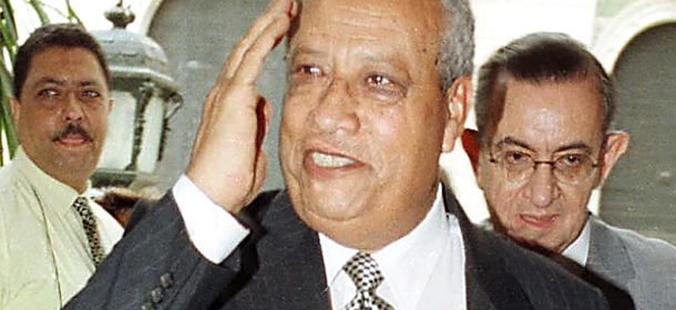 Newly appointed Egyptian Prime Minister Atef Abeid waves as he arrives at the Parliament House in Cairo 05 October 1999. Abeid was appointed by by President Hosni Mubarak in replacement of Kamal al-Ganzuri. (Photo credit should read AMR MAHMOUD/AFP/Getty Images)
