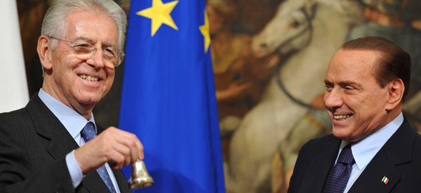 Italy&#8217;s new Prime Minister Mario Monti (L) rings the bell he received from outgoing Prime Minister Silvio Berlusconi marking the moment he takes office on November 16, 2011 at Palazzo Chigi, the Prime Ministry in Rome. Mario Monti took over as Italy&#8217;s new prime minister and appointed himself finance minister on Wednesday as he unveiled a technocratic cabinet to rescue the eurozone heavyweight from bankruptcy. AFP PHOTO / ALBERTO PIZZOLI (Photo credit should read ALBERTO PIZZOLI/AFP/Getty Images)
