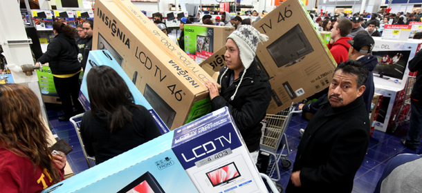 SAN DIEGO, CA &#8211; NOVEMBER 25: Customers shop for electronics items during &#8216;Black Friday&#8217; at a Best Buy store on November 25, 2011 San Diego, California. Thousands of consumers are queuing at various stores across the nation to take advantage of &#8216;Black Friday&#8217; deals as the holiday shopping season begins in America. (Photo by Sandy Huffaker/Getty Images)
