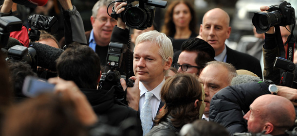 WikiLeaks founder Julian Assange (C) walks through a mass of media personnel as he arrives at London&#8217;s High Court on November 2, 2011. Julian Assange finds out on Wednesday whether he will be forced to leave Britain in order to face questioning over rape allegations in Sweden. The High Court in London is set to announce at 0945 GMT whether the 40-year-old Australian, whose whistleblowing website has enraged governments around the world, should be extradited following his arrest in December. AFP PHOTO / BEN STANSALL (Photo credit should read BEN STANSALL/AFP/Getty Images)
